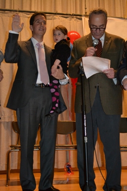 THE COURIER/Photos by Melissa Chan. Senator Charles Schumer formally swore Assemblymember Phillip Goldfeder into office.