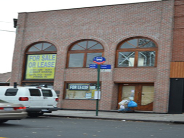 Stores along Queens’ prominent shopping streets have been sitting vacant for months.