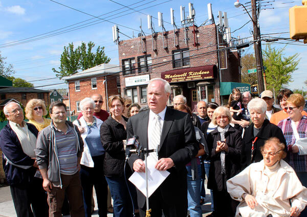 Avella protests cluster of cell towers on office