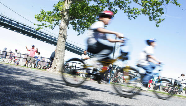 Wheelie contest along Shore Blvd. Sunday