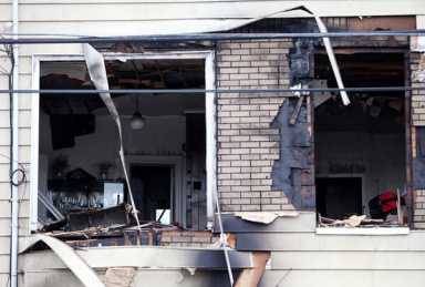 Flushing inferno destroys shops