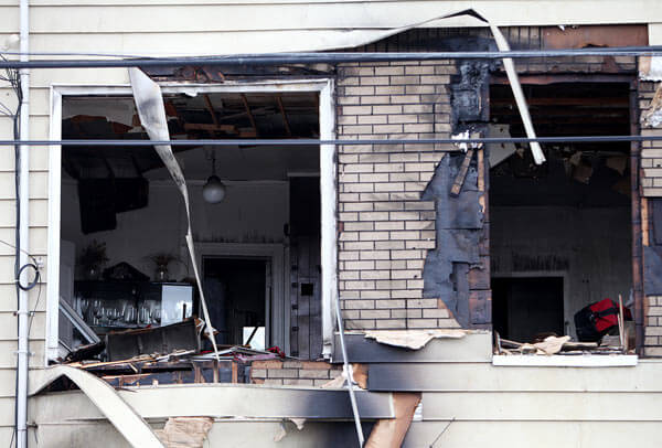 Flushing inferno destroys shops