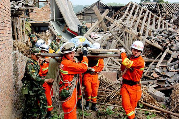 Flushing philanthropists give cash after quake