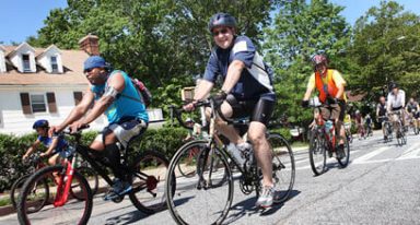 SUMMER FUN: Bicyclists hit the road all across the borough