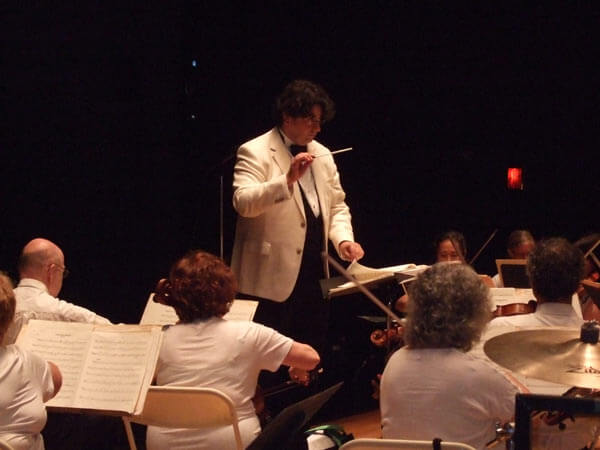 Queens symphony to perform free concerts