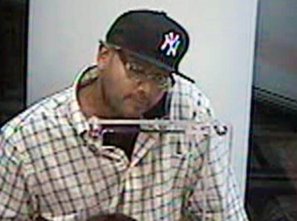 Police hunting for suspect in western Queens bank robberies