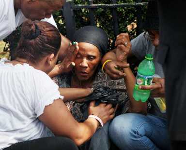 Woman faints at outdoor Woodside news event