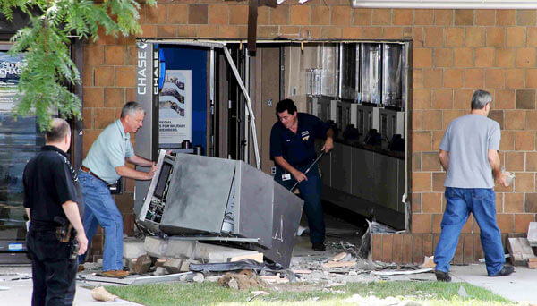 Thieves use backhoe for bank heist: Cops