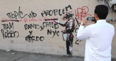 Graffiti artist Banksy creates mural on Woodside wall