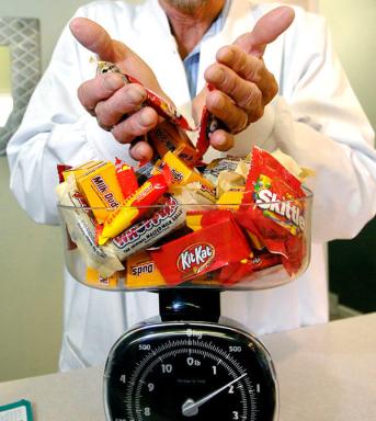 Dentists in Bayside collect Halloween candy to prevent cavities