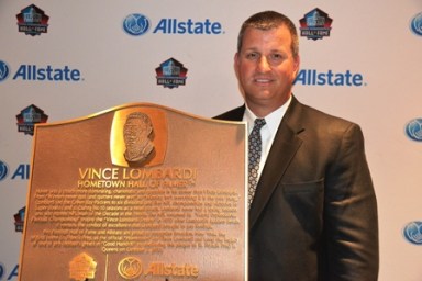 Football legend Vince Lombardi was honored at his alma mater St. Francis Prep. His grandson, John, accepted a plaque in his honor.