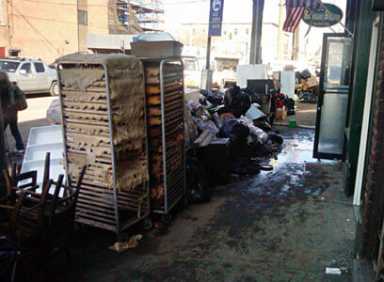 Bagel shop celebrates recovery a year after storm
