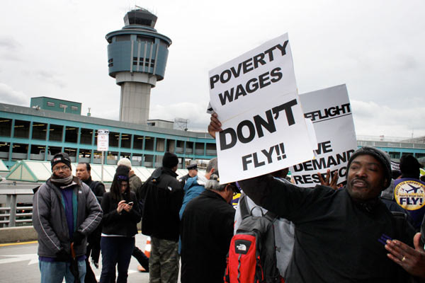 Airport workers protest at LGA