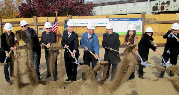 Officials break ground at Woodside school site