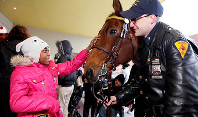 Police bring holiday cheer to St. Mary’s