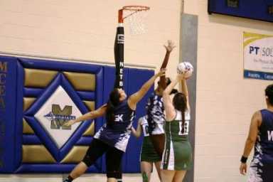 Girls playing netball