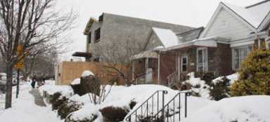 Flushing neighbors blast new house on block