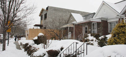 Flushing neighbors blast new house on block