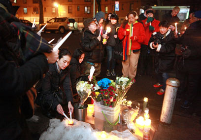 Young man recalled at vigil year after death in Queensbridge