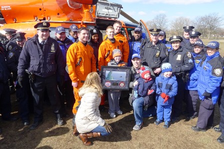NYPD and U.S. Coast Guard officials with Colin Flood.
