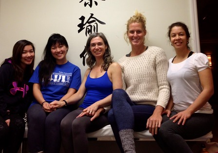 Betsey Armstrong with teachers and students at the Yumcha Yoga studio