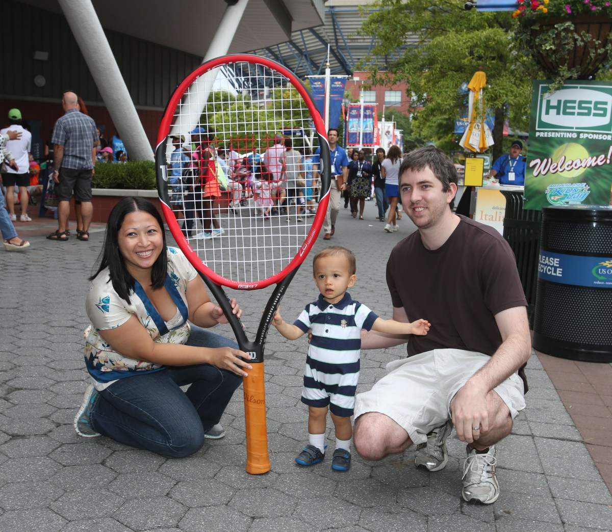 16-month-old Noah Val of Whitestone at his first US Open event with his parents, Jennifer and Peter.
