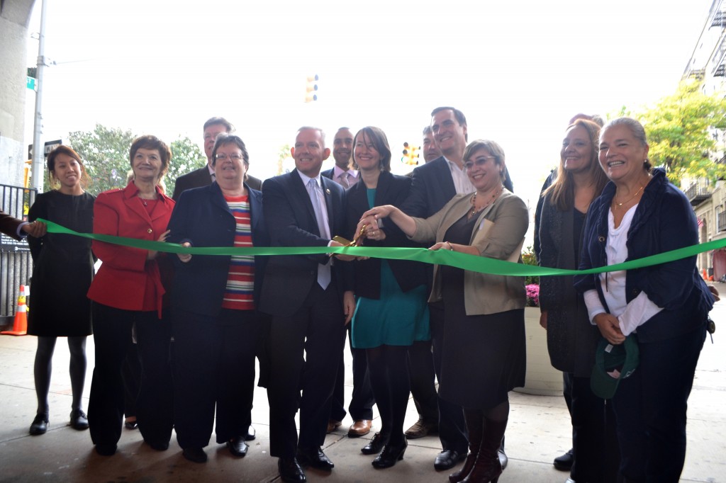 Local elected officials, leaders and business owners cut the ribbon opening Lowery Plaza.
