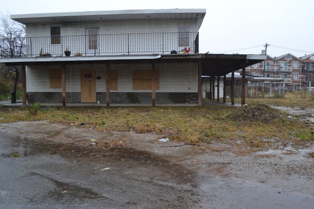 Under a new proposed law, abandoned homes like this one in Howard Beach, would become the responsibility of the lender.