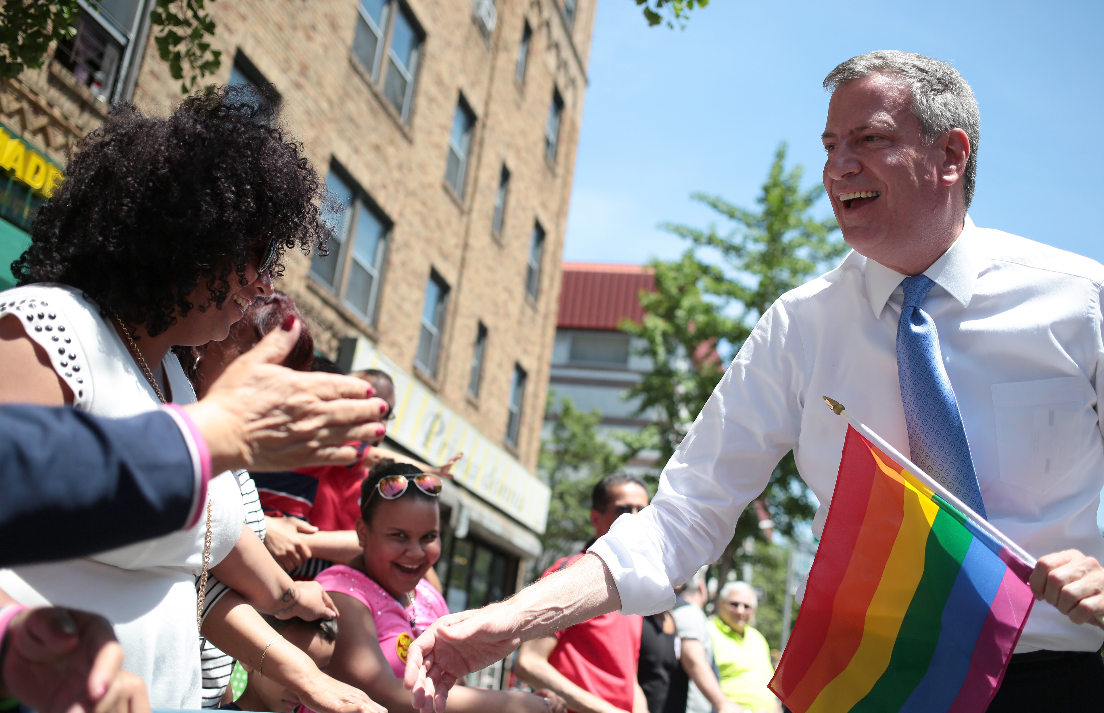 Mayor Bill de Blasio was the first mayor to march in the Queens Pride Parade in 2014.