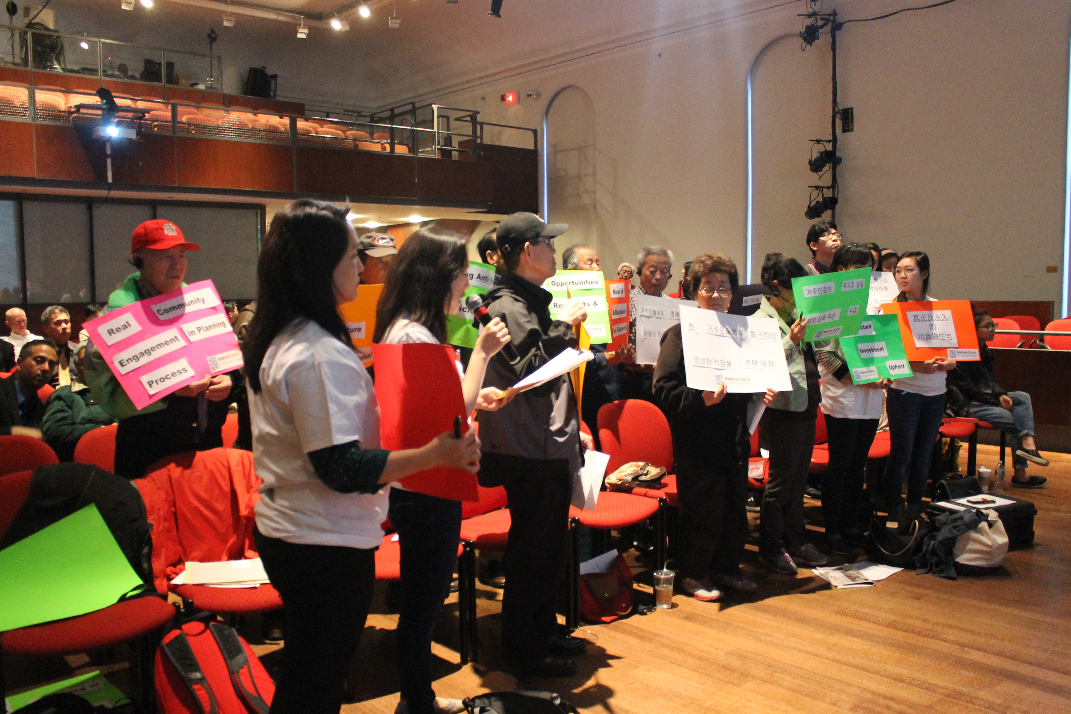 Members of the MinKwon Center for Community Action stood together to demonstrate their support for affordable housing in potential re-zoning of Flushing.