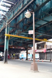 The "yellow colored" lights that used to run down Roosevelt Avenue will be replaced. 