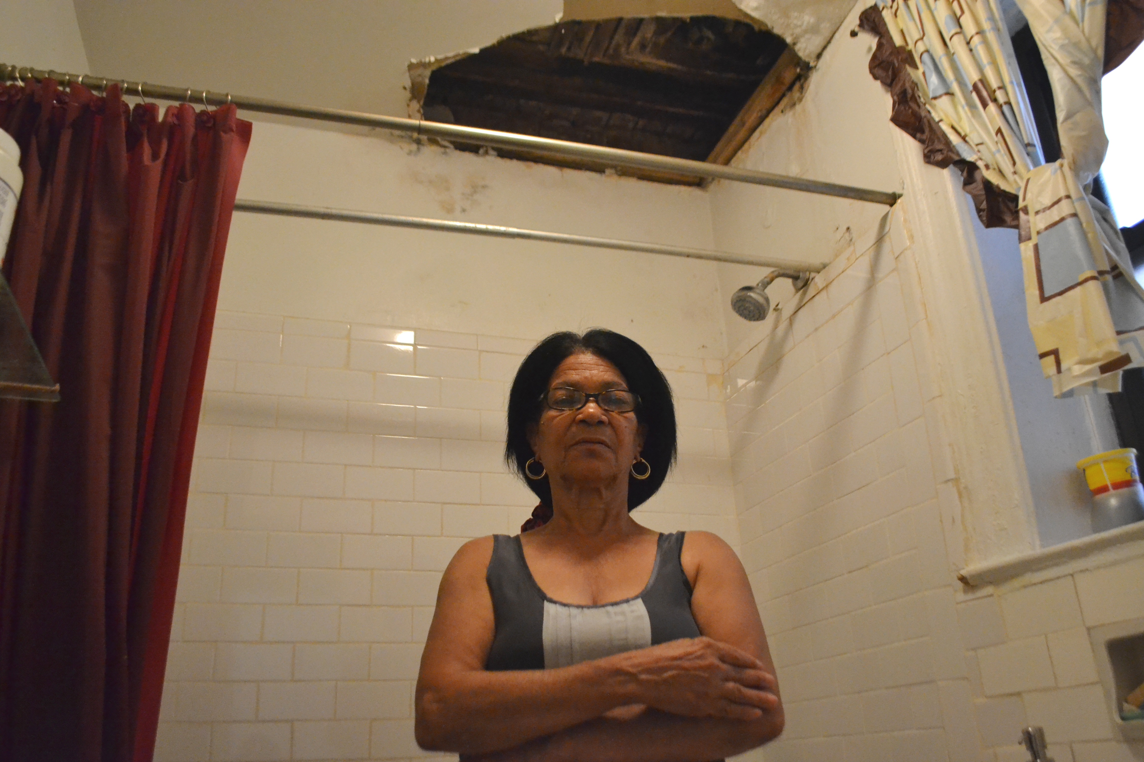 Enriqueta Vicioso, who has been living at the site for 15 years, calls the conditions she lives in “fatal” as she is afraid to shower in her bathroom because there is a gaping hole in the ceiling.