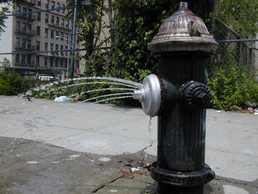 Fire_hydrant_with_water_in_brooklyn_new_york