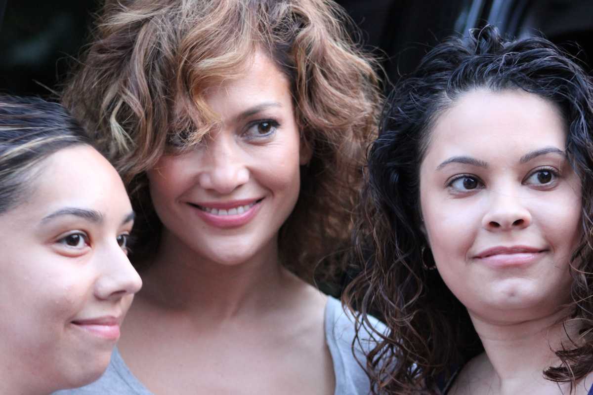 Actress and recording star Jennifer Lopez posed with sisters Veronica and Annette Vera on the set of the new NBC series "Shades of Blue" in Maspeth. Lopez and co-star Ray Liotta filmed interior scenes for the series at the Vera home on Wednesday.