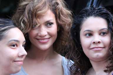 Actress and recording star Jennifer Lopez posed with sisters Veronica and Annette Vera on the set of the new NBC series "Shades of Blue" in Maspeth. Lopez and co-star Ray Liotta filmed interior scenes for the series at the Vera home on Wednesday.
