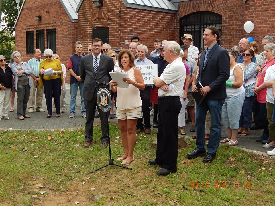 Maria Becce of the Broadway-Flushing Homeowner's Association speaks at the rally.