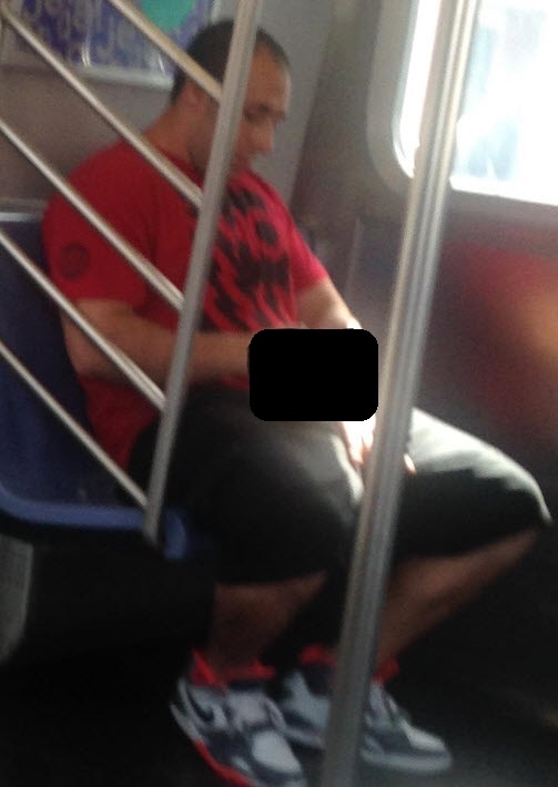 Police are looking for this suspect, who was photographed in the middle of a lewd act in Astoria.