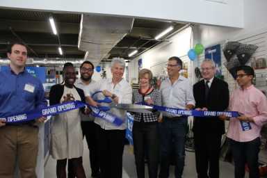 Habitat for Humanity NYC Chief Executive Officer Karen Haycox (center) along with local officials cut the ribbon on Habitat for Humanity's newest ReStore location in Woodside.