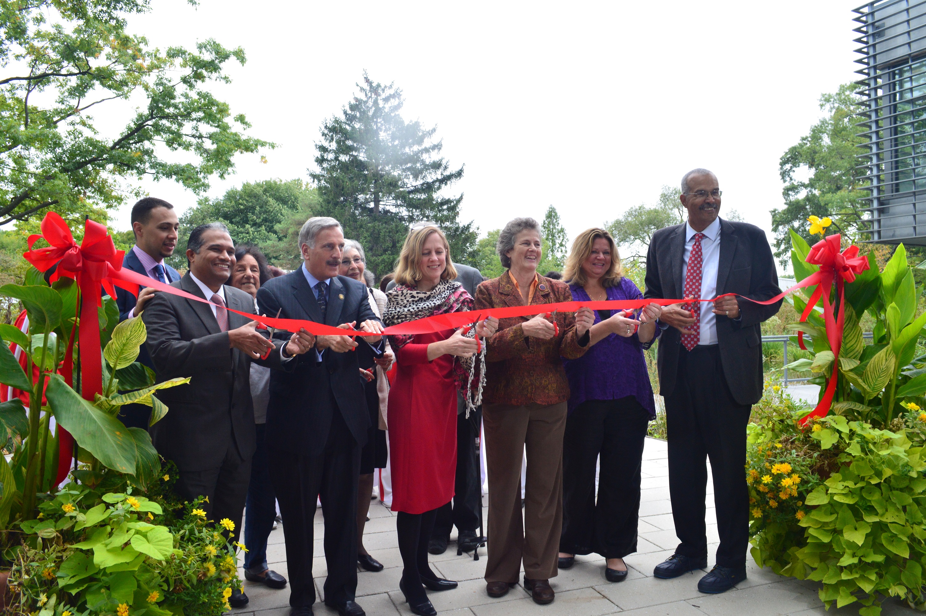 A ceremonial ribbon cutting of the new walkways in the Queens Botanical Garden.