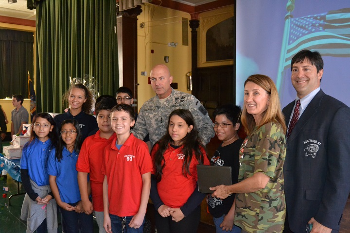 Lieutenant General Joseph Anderson (center back) with students from I.S. 93, Debbie Hartz, guidance counselor, and Edward Santos , principal at I.S. 93.