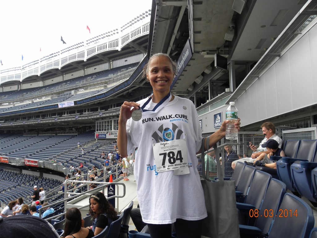 Evelyn Gomez participating in her first race for the Damon Runyon Cancer Research Foundation.