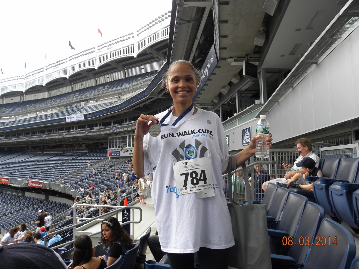 Evelyn Gomez participating in her first race for the Damon Runyon Cancer Research Foundation.