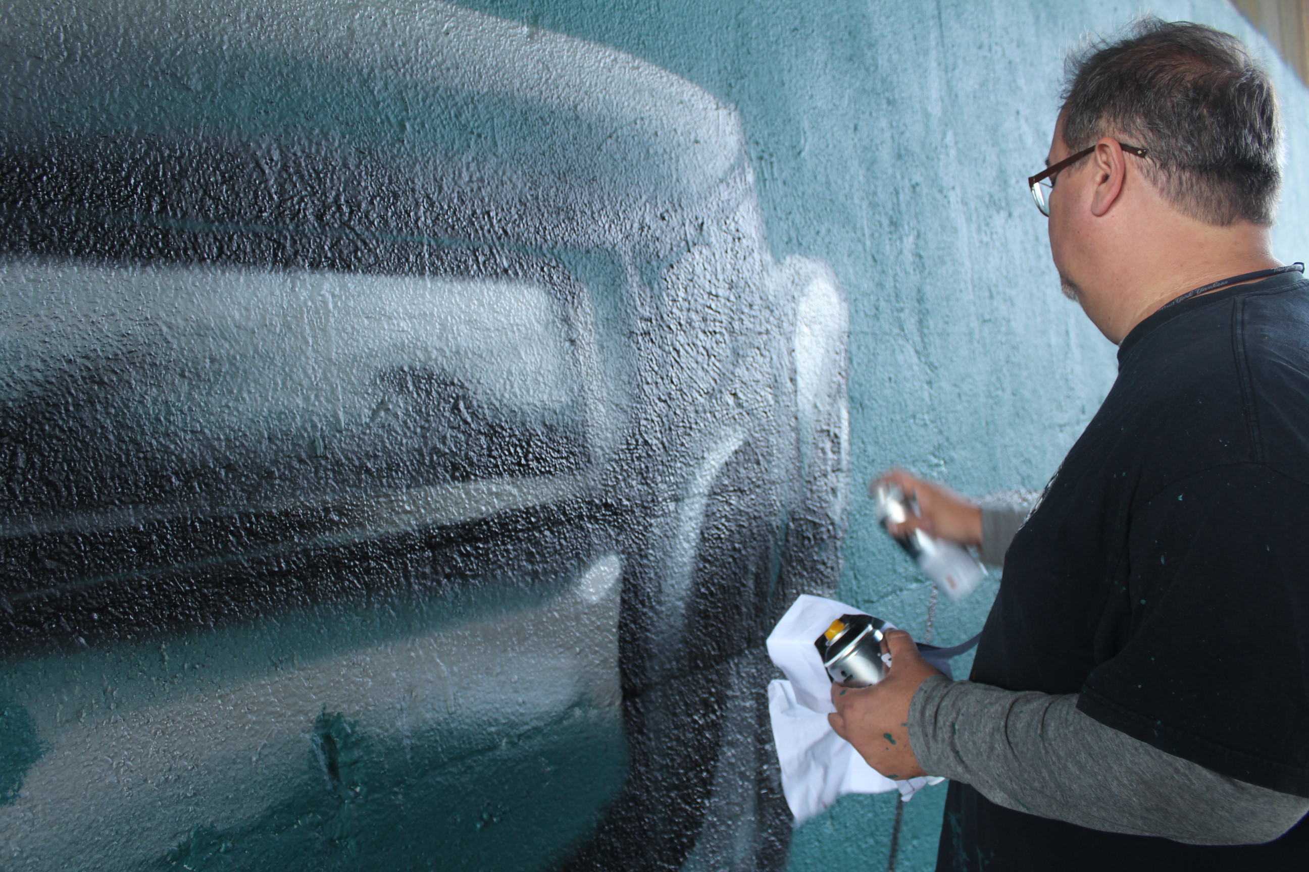 A nonprofit organization is transforming an Astoria wall with art.