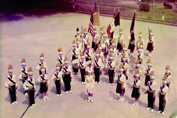 The Our Lady of the Miraculous Medal Orbits marching band are pictured in the OLMM School yard in Ridgewood. The date of the photograph is unknown, but band member Bill Krouslis believes it was taken during the mid 1960s.