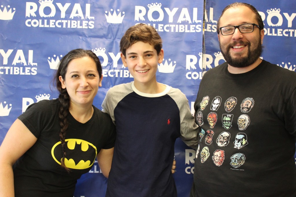 Mazouz (center) with Royal Collectibles co-owner Michale Giordano and Diane Lazauskas