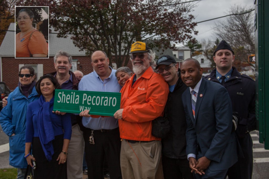 Members of the Pecoraro family and Councilman Donovan Richards renamed a portion of Huxley Street in Ridgewood for Sheila Pecoraro (inset), a local civic activist.