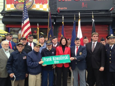 Members of the Polish Legion of American Veterans are among those pictured with City Councilwoman Elizabeth Crowley on Veterans Day at a street renaming ceremony honoring Frank Kowalinski, a Maspeth man who died while serving the U.S. in World War I.