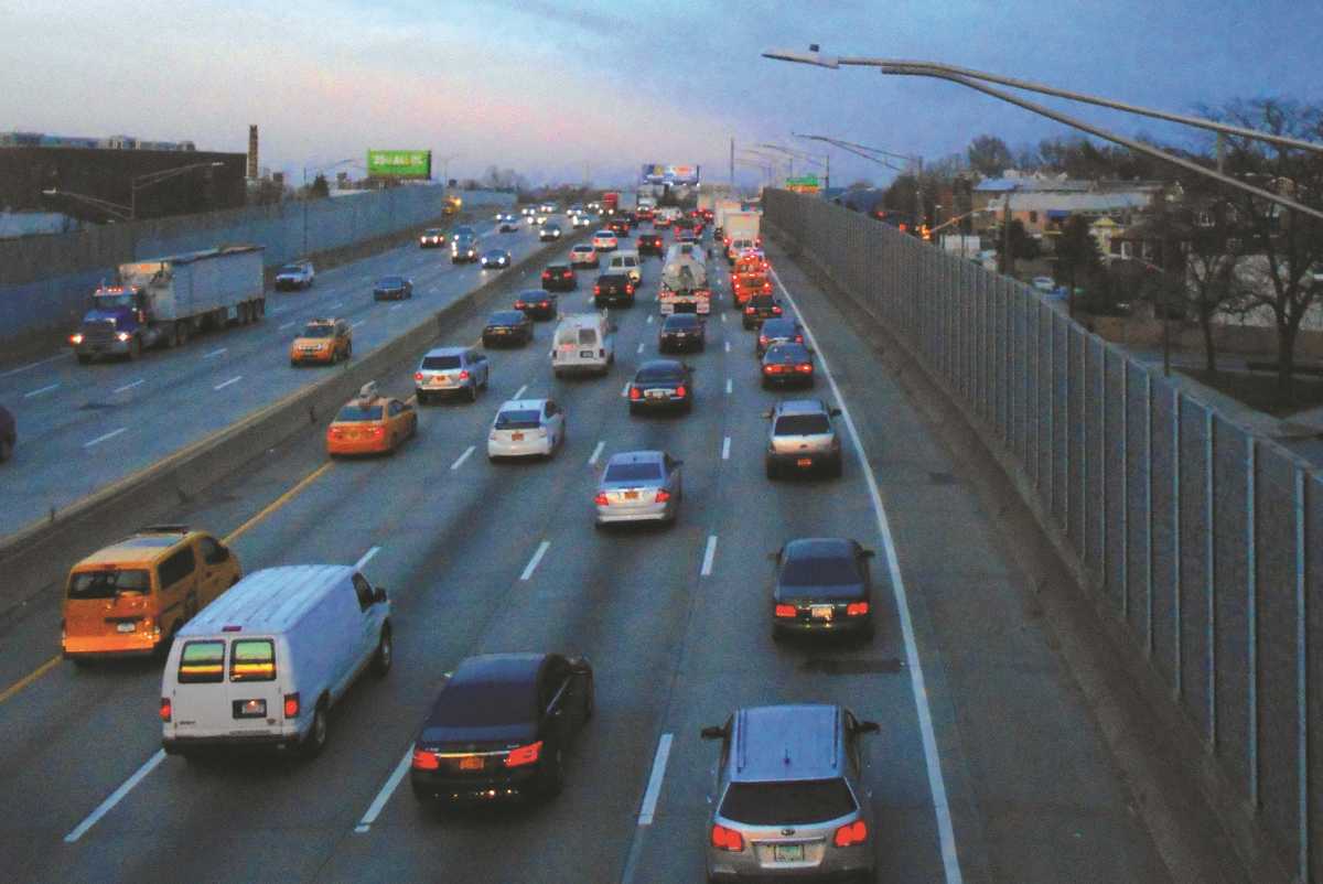 A concrete portion of the Long Island Expressway through Maspeth and Middle Village should be paved with asphalt, according to Juniper Park Civic Association members.