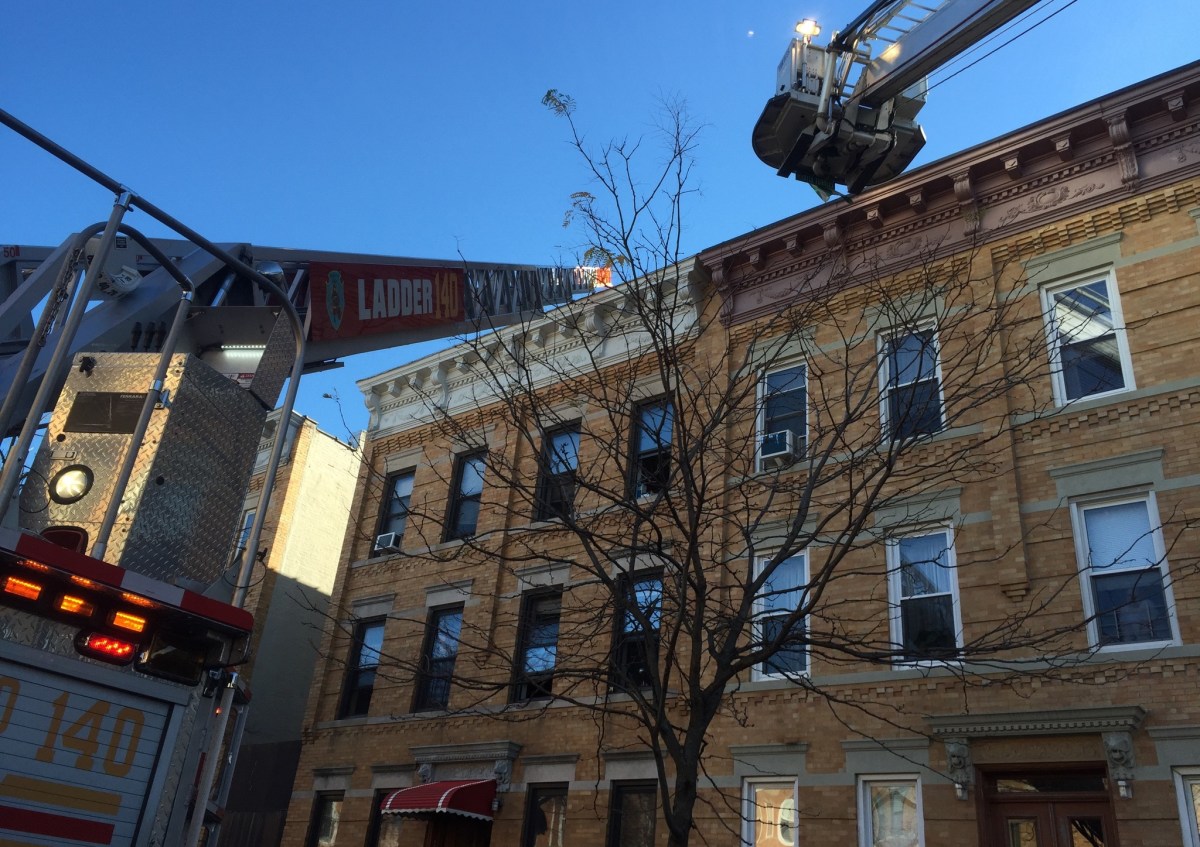 Two officers were injured in a fire in a Ridgewood apartment building on Saturday morning.