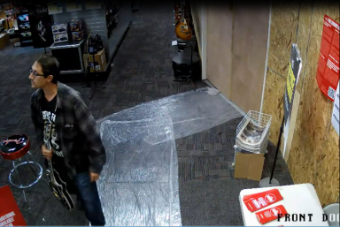 Police are looking for a man who stole a guitar from a Guitar Center in Long Island City.